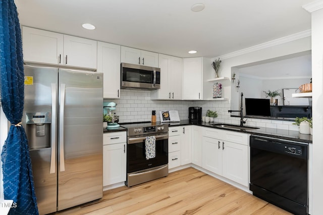110 Taylors Pond Dr, Cary, NC 27511 - kitchen with appliances with stainless steel finishes, open shelves, dark countertops, white cabinets, and ornamental molding