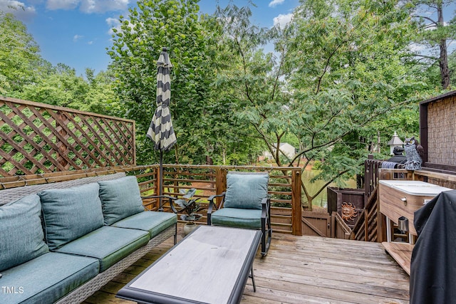 110 Taylors Pond Dr, Cary, NC 27511 - wooden deck with an outdoor living space