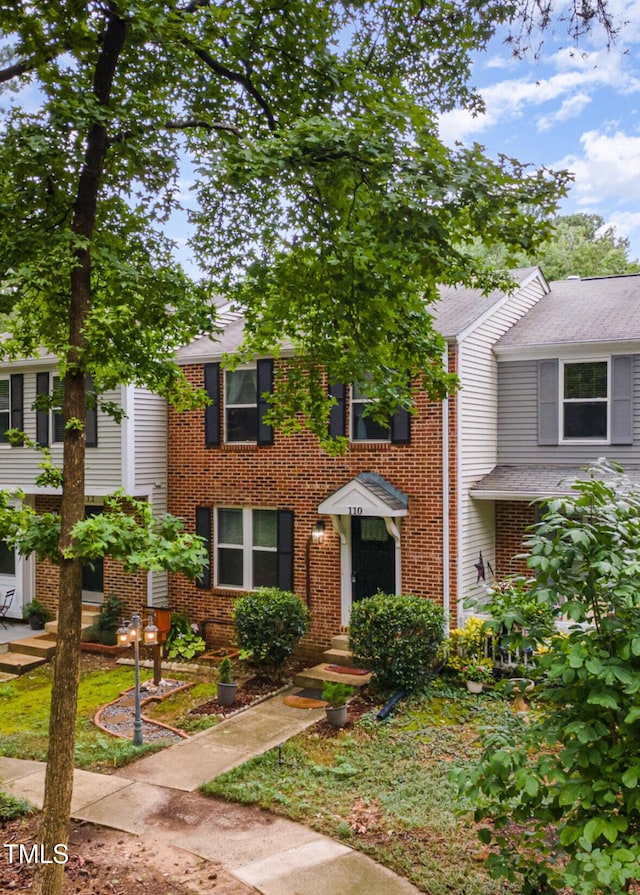 110 Taylors Pond Dr, Cary, NC 27511 - view of front of house featuring brick siding