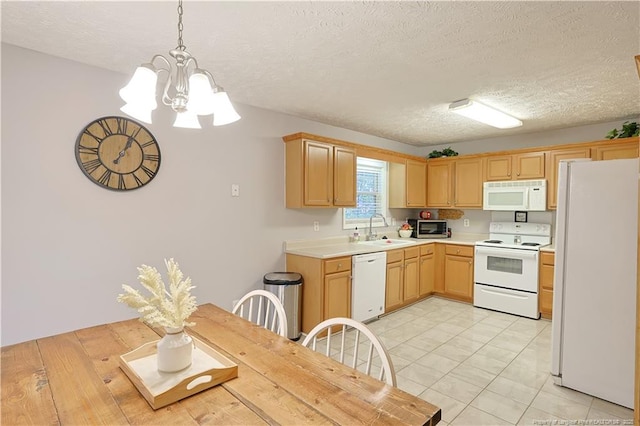 119 Proclamation Dr, Raeford, NC 28376 - kitchen with white appliances, a sink, light countertops, a chandelier, and light brown cabinets