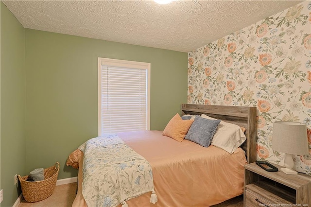 119 Proclamation Dr, Raeford, NC 28376 - bedroom featuring a textured ceiling, wallpapered walls, and baseboards