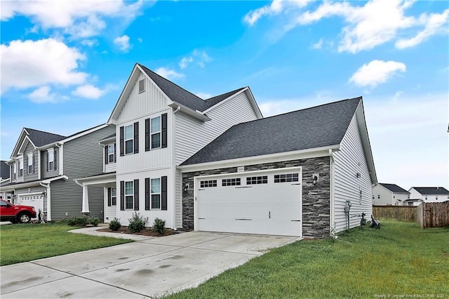 1664 Seattle Slew Ln, Hope Mills, NC 28348 - view of front of property featuring stone siding, concrete driveway, board and batten siding, a garage, and roof with shingles