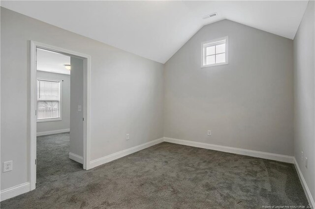 1664 Seattle Slew Ln, Hope Mills, NC 28348 - bonus room with carpet, vaulted ceiling, and baseboards