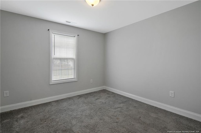 1664 Seattle Slew Ln, Hope Mills, NC 28348 - carpeted empty room featuring baseboards