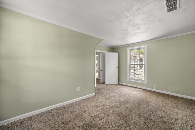 2527 Ossipee Front St, Elon, NC 27244 - unfurnished bedroom with carpet flooring, baseboards, and crown molding