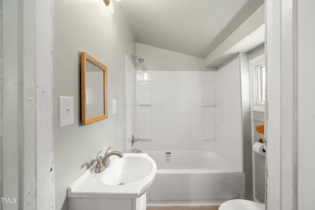 2527 Ossipee Front St, Elon, NC 27244 - bathroom with vanity, bathing tub / shower combination, toilet, and vaulted ceiling