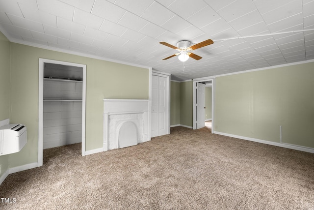 2527 Ossipee Front St, Elon, NC 27244 - unfurnished bedroom with multiple closets, carpet flooring, ornamental molding, baseboards, and ceiling fan
