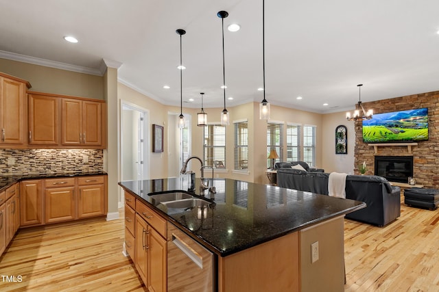 5003 Blue Jack Oak Dr, Cary, NC 27519 - kitchen with a sink, open floor plan, light wood-type flooring, an island with sink, and recessed lighting