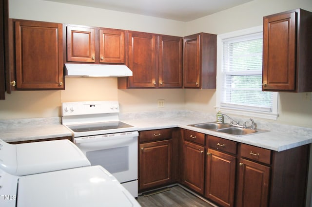 2626 Crestline Ave, Raleigh, NC 27603 - kitchen featuring white range with electric stovetop, under cabinet range hood, a sink, and light countertops