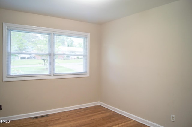 2626 Crestline Ave, Raleigh, NC 27603 - unfurnished room featuring baseboards and wood finished floors