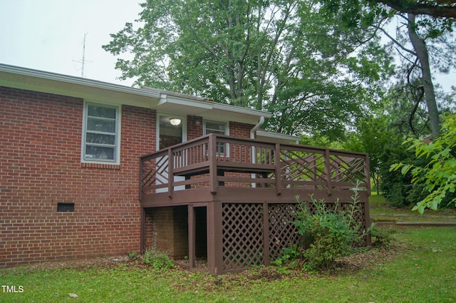 2626 Crestline Ave, Raleigh, NC 27603 - back of property with a deck and brick siding