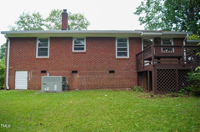 2626 Crestline Ave, Raleigh, NC 27603 - back of house featuring cooling unit, a lawn, a chimney, a wooden deck, and crawl space