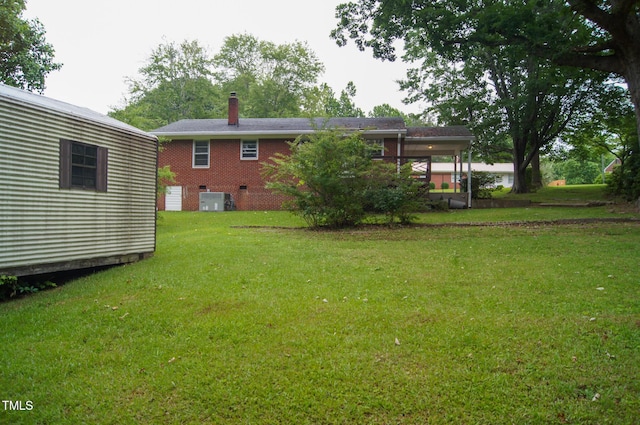 2626 Crestline Ave, Raleigh, NC 27603 - view of green lawn featuring central AC