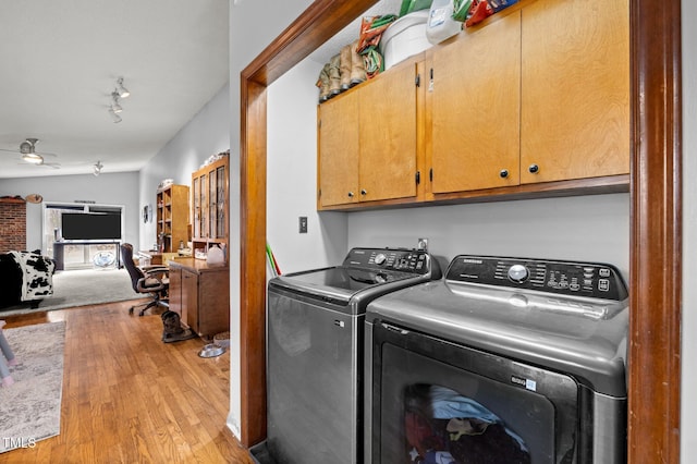 501 Enon Rd, Oxford, NC 27565 - laundry room featuring cabinet space, wood finished floors, separate washer and dryer, and a ceiling fan
