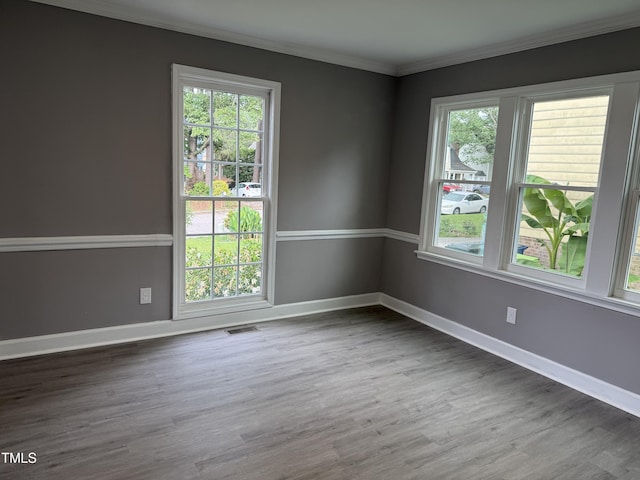 3825 Old Coach Rd, Raleigh, NC 27616 - unfurnished room featuring wood finished floors, ornamental molding, and baseboards