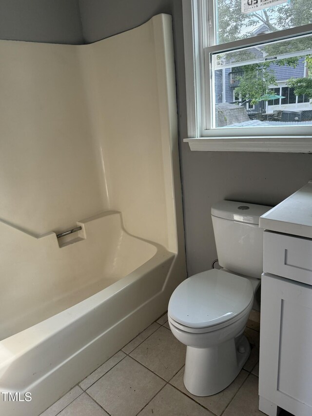 3825 Old Coach Rd, Raleigh, NC 27616 - bathroom with tile patterned floors, toilet, vanity, and shower / washtub combination