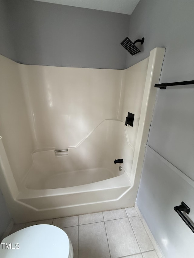 3825 Old Coach Rd, Raleigh, NC 27616 - full bathroom with toilet, tile patterned floors, and washtub / shower combination