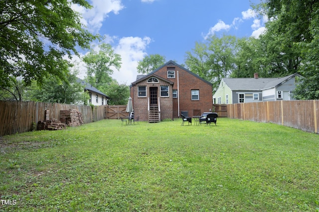 106 E Club Blvd, Durham, NC 27704 - back of house featuring brick siding