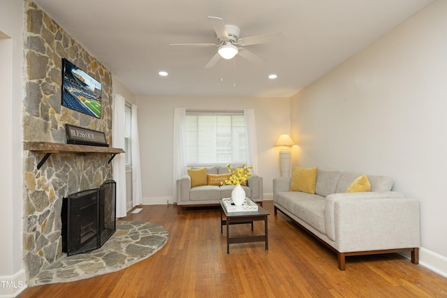 106 E Club Blvd, Durham, NC 27704 - living area with wood finished floors, a fireplace, a ceiling fan, baseboards, and recessed lighting
