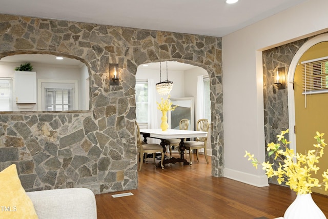 106 E Club Blvd, Durham, NC 27704 - dining room with wood finished floors and arched walkways