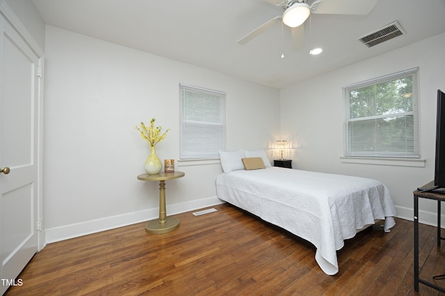 106 E Club Blvd, Durham, NC 27704 - bedroom with wood finished floors, baseboards, and ceiling fan