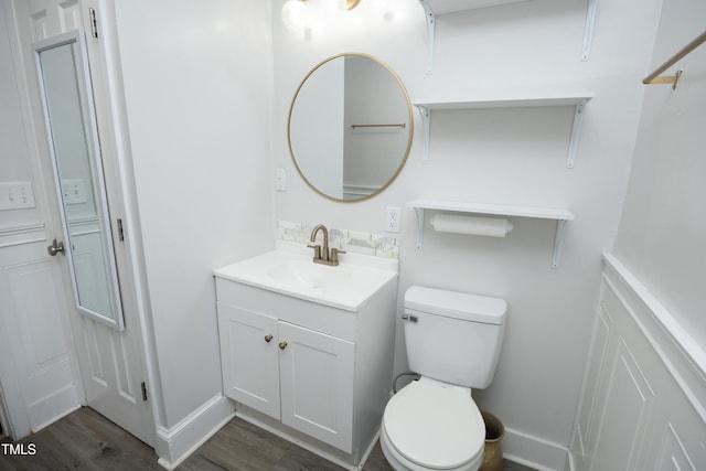 106 E Club Blvd, Durham, NC 27704 - bathroom with vanity, wood finished floors, and toilet