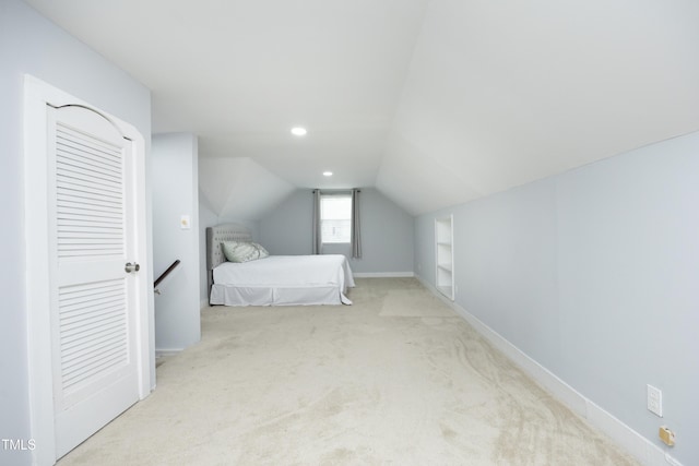106 E Club Blvd, Durham, NC 27704 - carpeted bedroom featuring lofted ceiling, baseboards, and recessed lighting