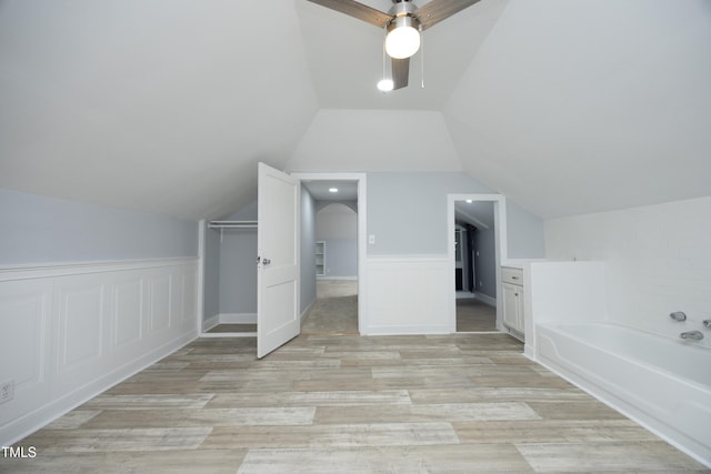 106 E Club Blvd, Durham, NC 27704 - additional living space with ceiling fan, lofted ceiling, light wood-style floors, and wainscoting