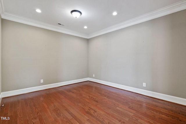 3628 Eagle Farm Dr N, Wilson, NC 27896 - unfurnished room with ornamental molding, baseboards, wood finished floors, and recessed lighting