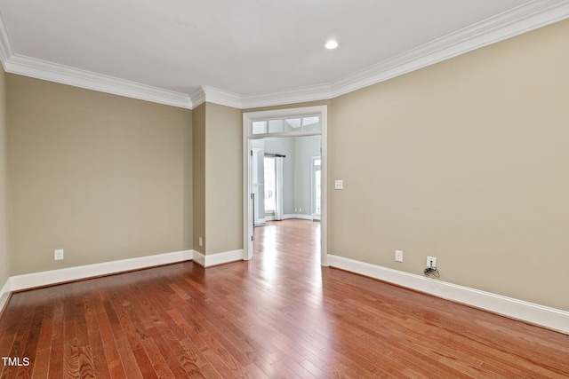 3628 Eagle Farm Dr N, Wilson, NC 27896 - spare room featuring wood finished floors, ornamental molding, baseboards, and recessed lighting