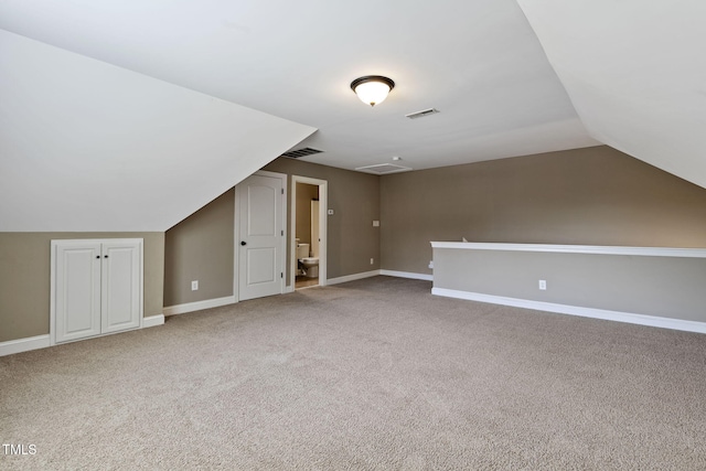 3628 Eagle Farm Dr N, Wilson, NC 27896 - bonus room featuring carpet, lofted ceiling, and baseboards