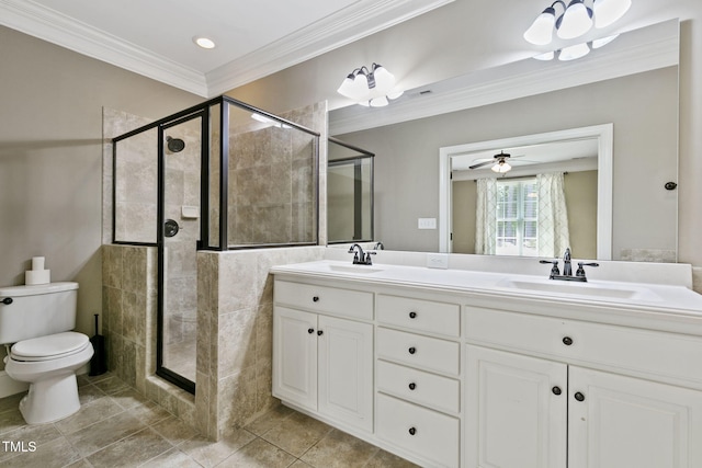 3628 Eagle Farm Dr N, Wilson, NC 27896 - bathroom with crown molding, a shower stall, double vanity, toilet, and tile patterned flooring