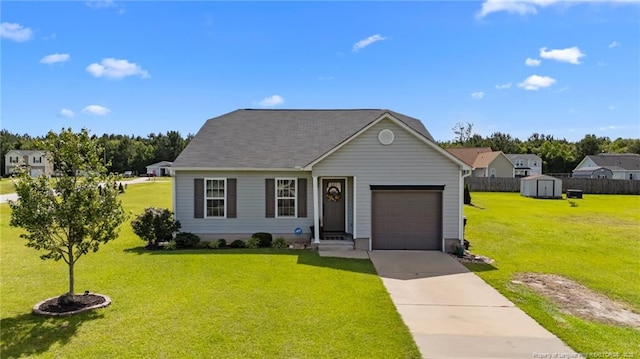 308 Hazel Dr, Stantonsburg, NC 27883 - view of front of house featuring a garage and concrete driveway