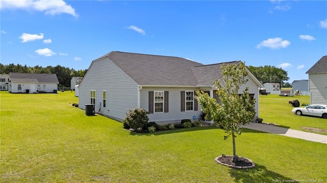 308 Hazel Dr, Stantonsburg, NC 27883 - view of front of house with a front yard and central AC