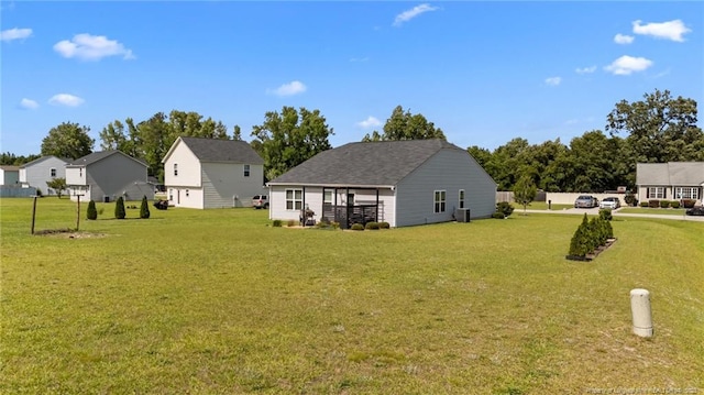 308 Hazel Dr, Stantonsburg, NC 27883 - view of green lawn with central air condition unit