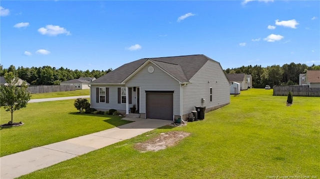 308 Hazel Dr, Stantonsburg, NC 27883 - view of front of house featuring a garage and concrete driveway