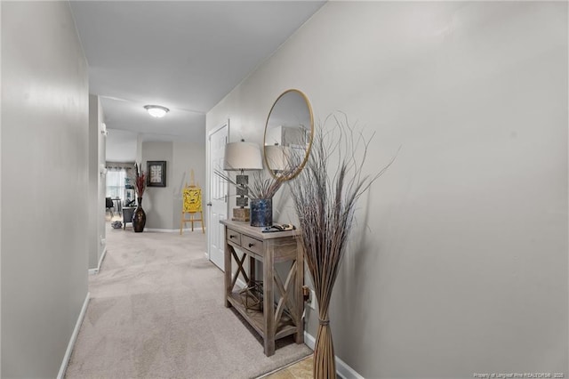 308 Hazel Dr, Stantonsburg, NC 27883 - corridor with light colored carpet and baseboards