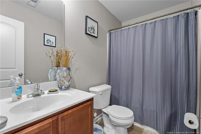 308 Hazel Dr, Stantonsburg, NC 27883 - full bath with vanity, toilet, and a shower with curtain