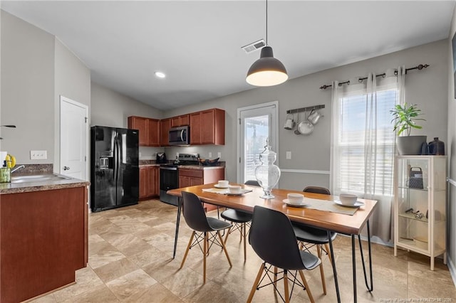 308 Hazel Dr, Stantonsburg, NC 27883 - dining space featuring lofted ceiling