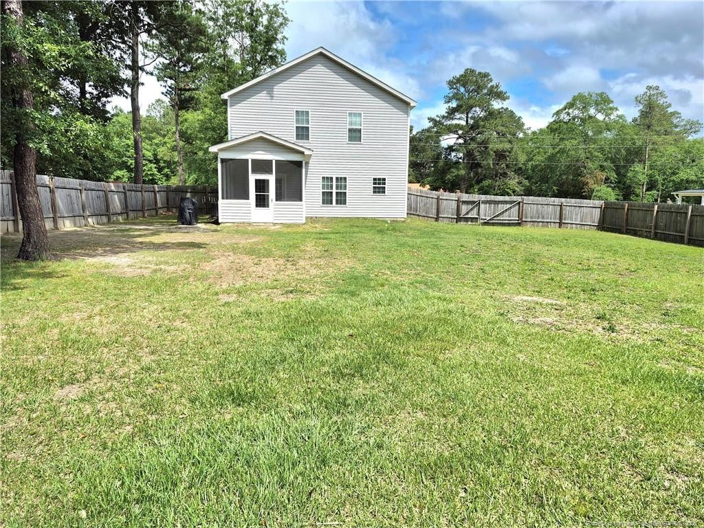 164 Merita Dr, Raeford, NC 28376 - rear view of property with a sunroom