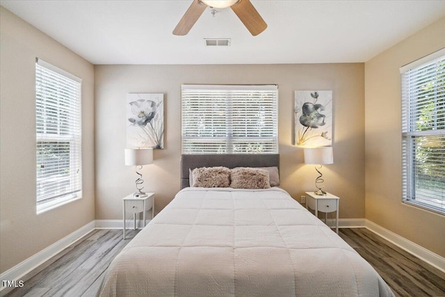 1912 Parkside Village Dr, Clayton, NC 27520 - bedroom featuring wood finished floors and a ceiling fan