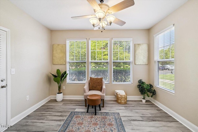 1912 Parkside Village Dr, Clayton, NC 27520 - sitting room with healthy amount of natural light, wood finished floors, and a ceiling fan