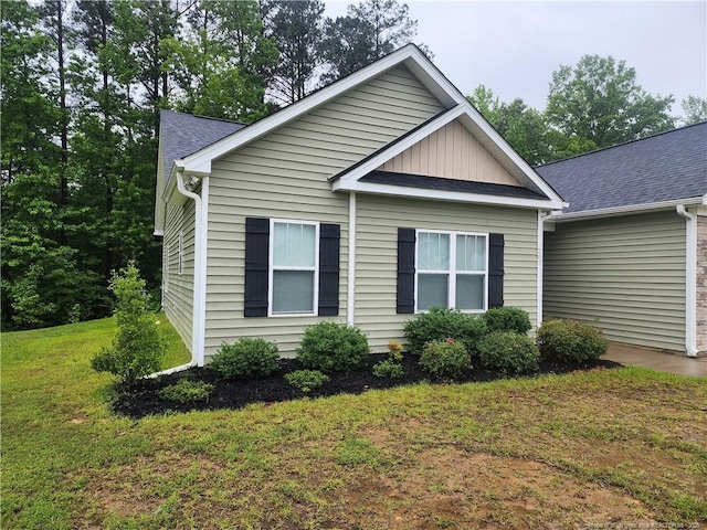 207 Southwick Ct, Sanford, NC 27332 - view of front of house with a front lawn and a shingled roof