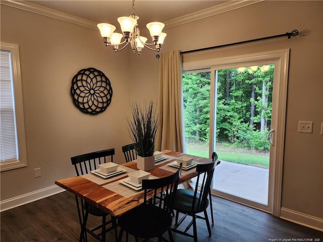 207 Southwick Ct, Sanford, NC 27332 - dining area with a chandelier, dark wood-style floors, ornamental molding, and baseboards