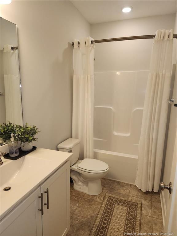 207 Southwick Ct, Sanford, NC 27332 - full bathroom featuring vanity, toilet, shower / tub combo with curtain, and recessed lighting