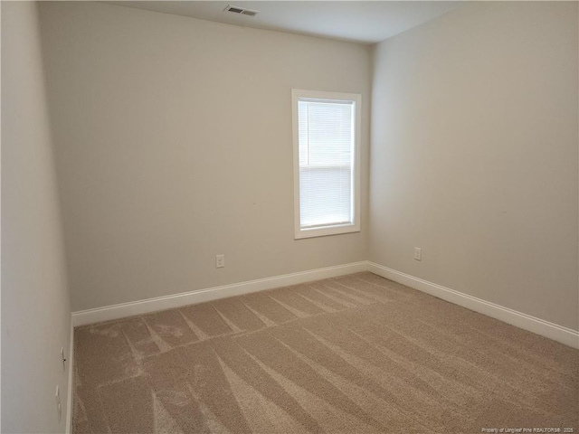 207 Southwick Ct, Sanford, NC 27332 - empty room with light colored carpet and baseboards