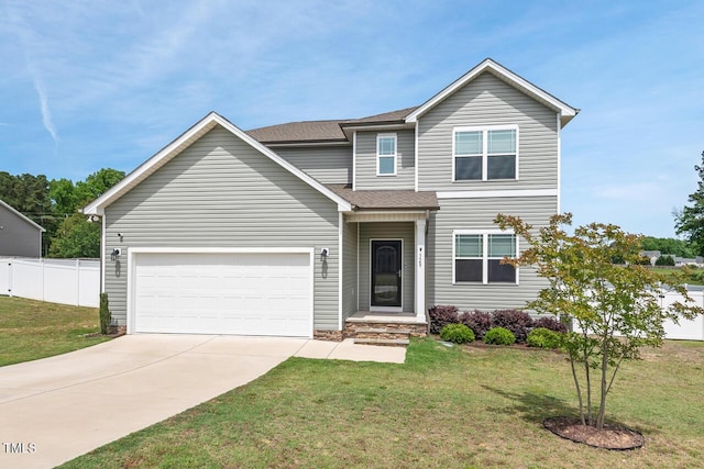 328 Avery Meadows Dr, Smithfield, NC 27577 - traditional-style house with concrete driveway, an attached garage, and a shingled roof