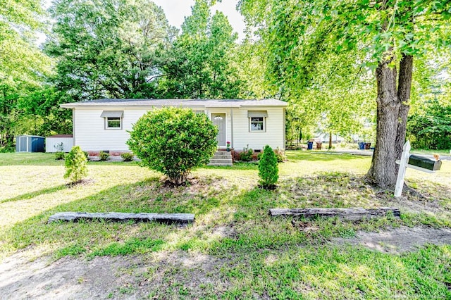 2327 Dewitt St, Sanford, NC 27330 - view of front of property featuring a front yard and crawl space
