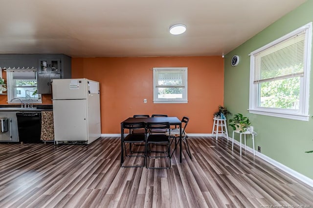 2327 Dewitt St, Sanford, NC 27330 - dining room featuring dark wood-type flooring and baseboards