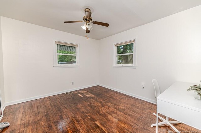 2327 Dewitt St, Sanford, NC 27330 - unfurnished office featuring hardwood / wood-style floors, ceiling fan, and baseboards